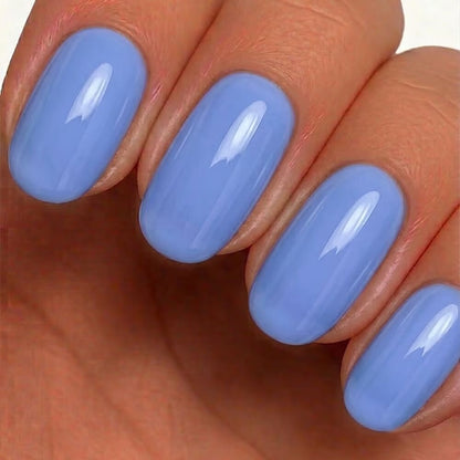 TOUCH Cover Base 19 — swatch on nail tip, light blue finish