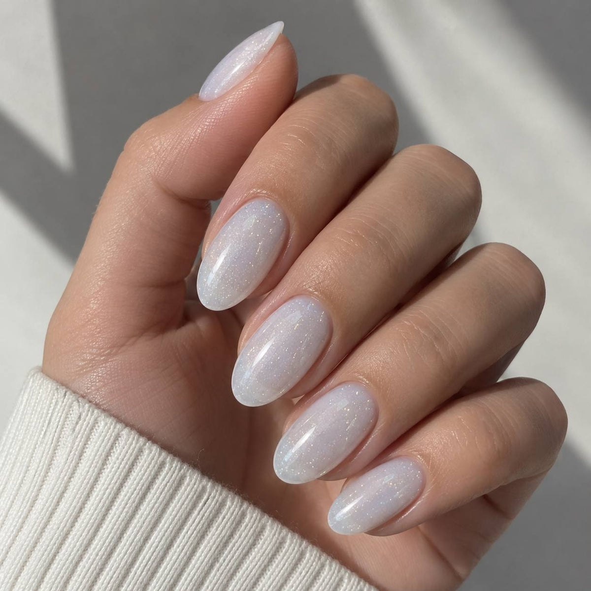 TOUCH Cover Base Milk Shine, 13ml, swatch on nail tip
