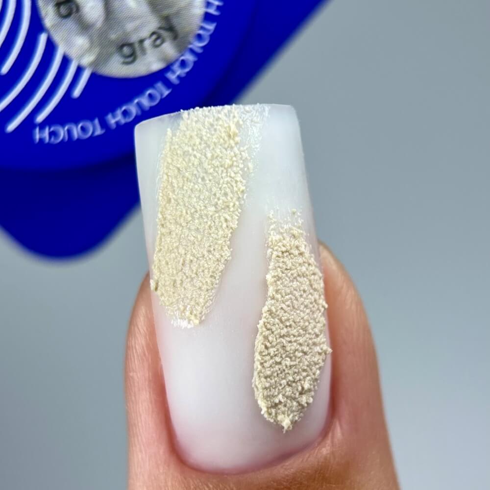 TOUCH Gypsum Gel Gray — 3D texture applied to nail tip
