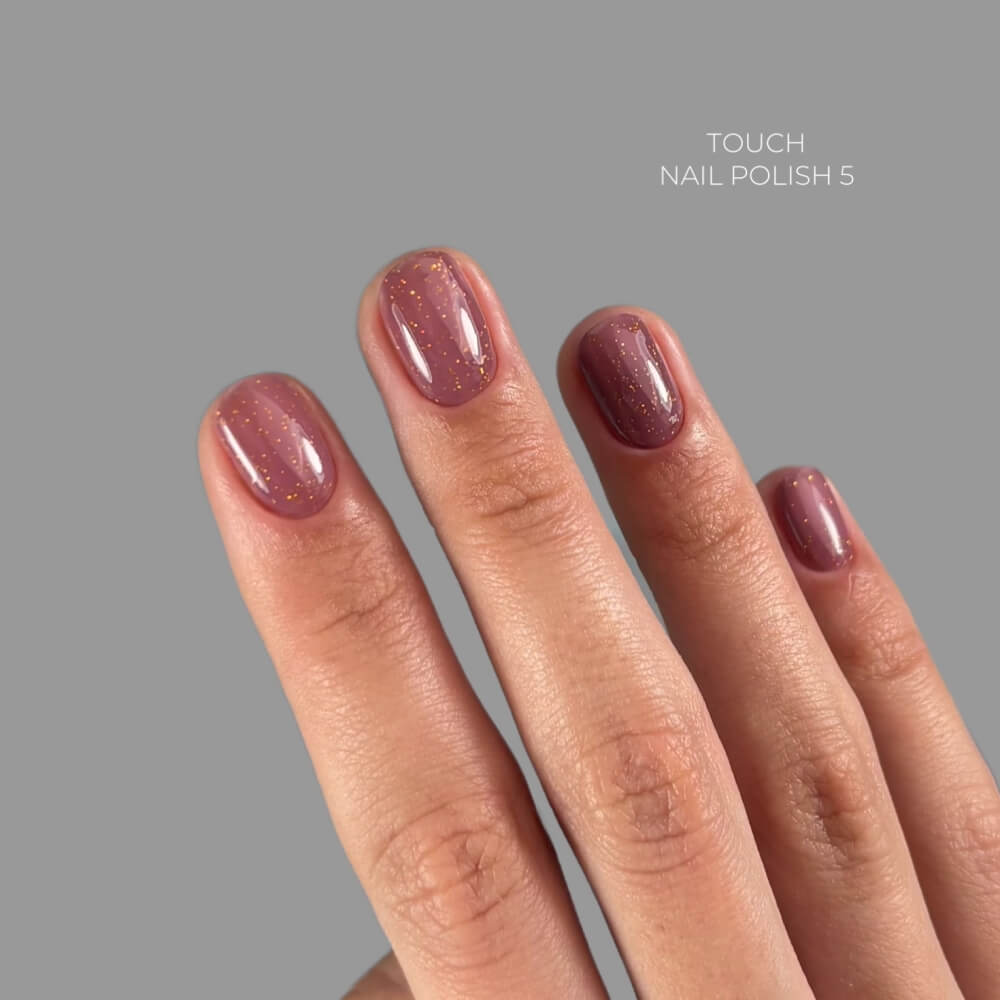 8ml — TOUCH Nail Polish 05 — swatch on nail tip, brown with gold flecks