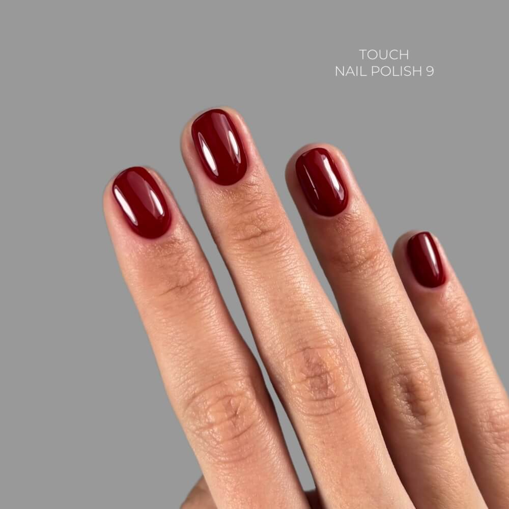 8ml — TOUCH Nail Polish 09 — swatch on nail tip, solid red finish