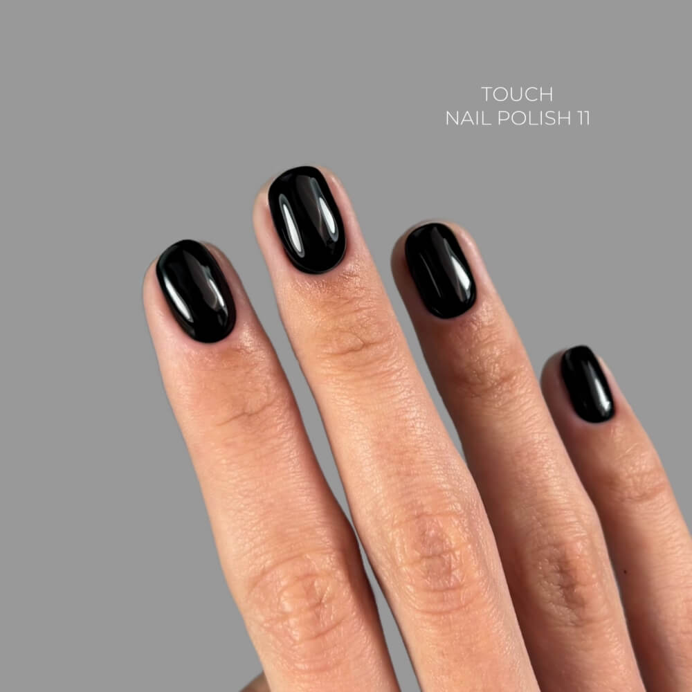 8ml — TOUCH Nail Polish 11 — swatch on nail tip, solid black finish
