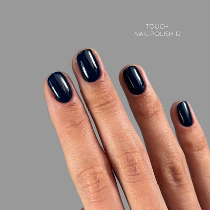 TOUCH Nail Polish 12 — swatch on nail tip, solid blue finish