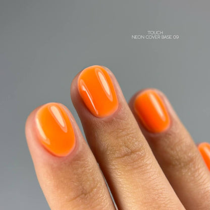 Professional orange colored base coat by TOUCH for vibrant neon nails