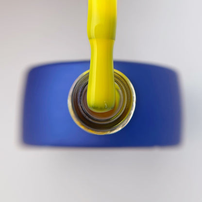 Neon yellow nail base by TOUCH for bold summer manicure designs