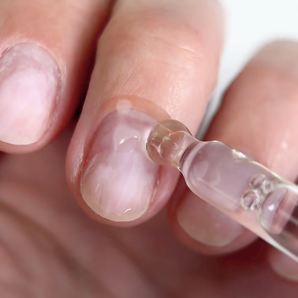 TOUCH Remover Green Flag — softened cuticle being pushed back