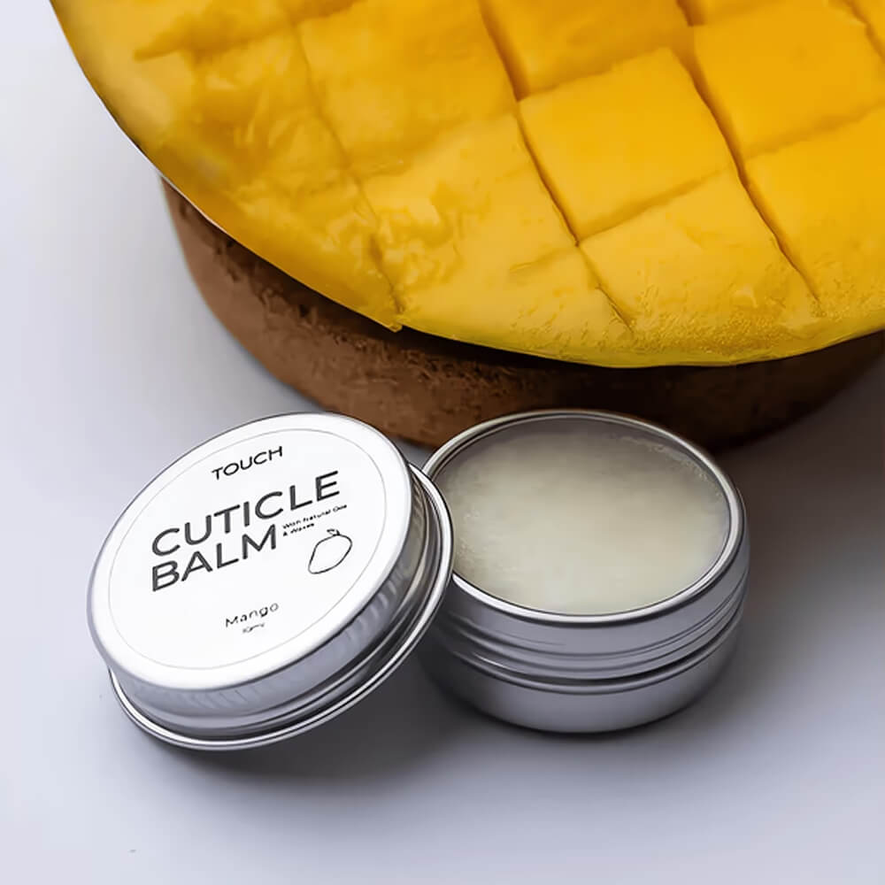 TOUCH Silver Line Cuticle Balm Mango — massaged into hands after manicure