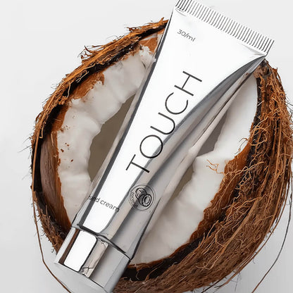 TOUCH Silver Line Hand Cream Coconut — being applied to hands