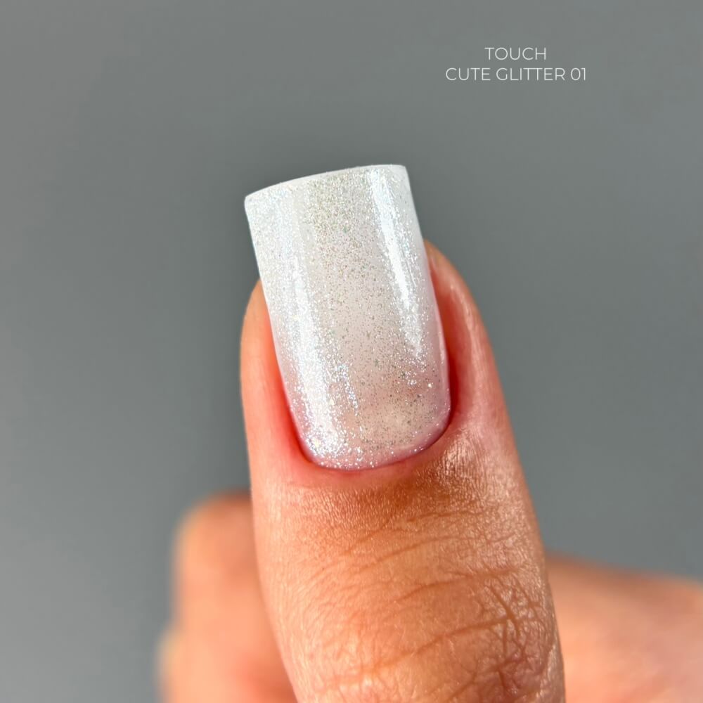 TOUCH Cute Glitter 1 — swatch on nail tip, silver sparkle finish