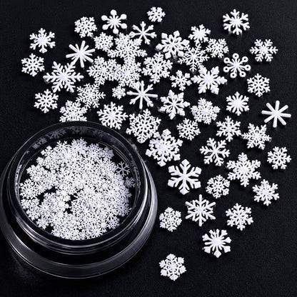 Assorted white snowflakes for Christmas nail art and winter-inspired nail designs
