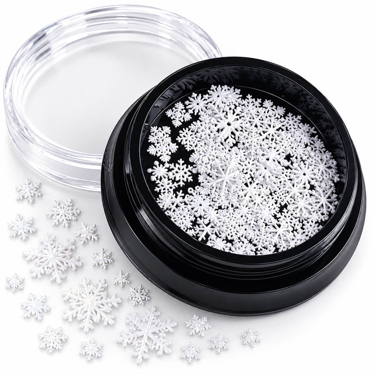 White snowflake nail art decorations in assorted sizes and patterns, 1 jar